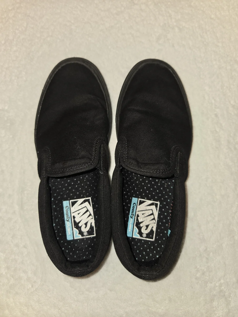 Vans Classic Slip-On Sneakers in Black
